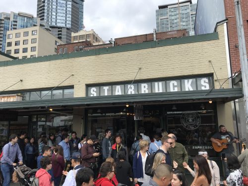 Long line in front of the first Starbucks