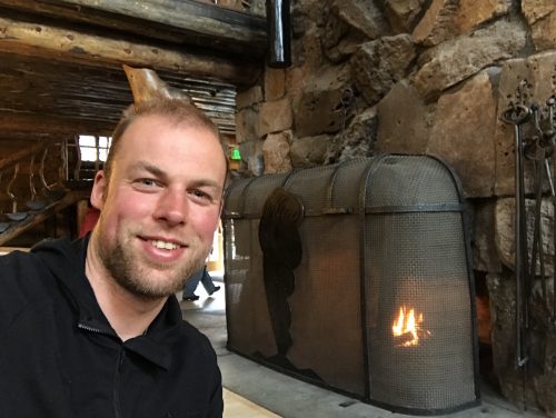 Me at the fireplace in Old faithful Inn