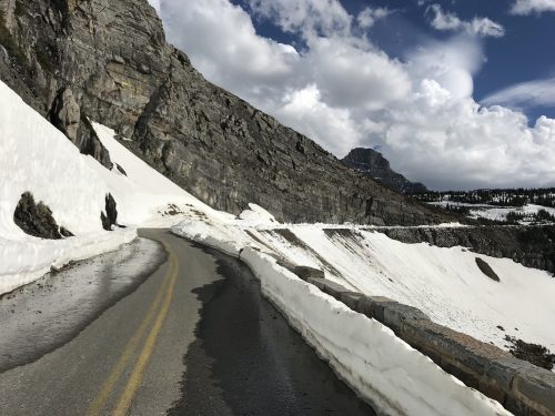 The road up is surrounded by snow