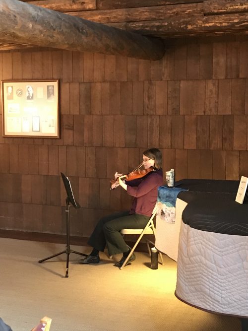 Violinist in Old faithful Inn