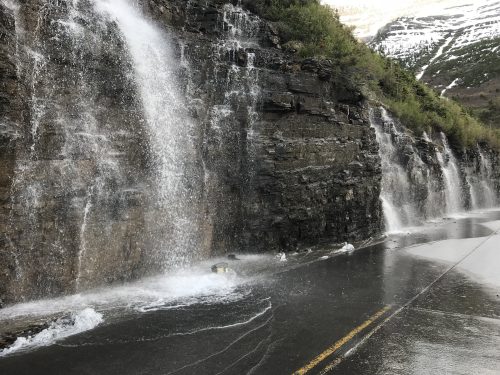Waterfalls at the road in Glacier National Park