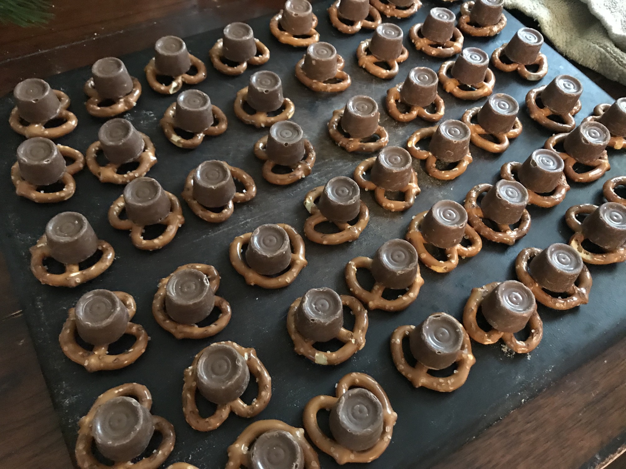 Making delicious simple cookies with rolos and pretzels