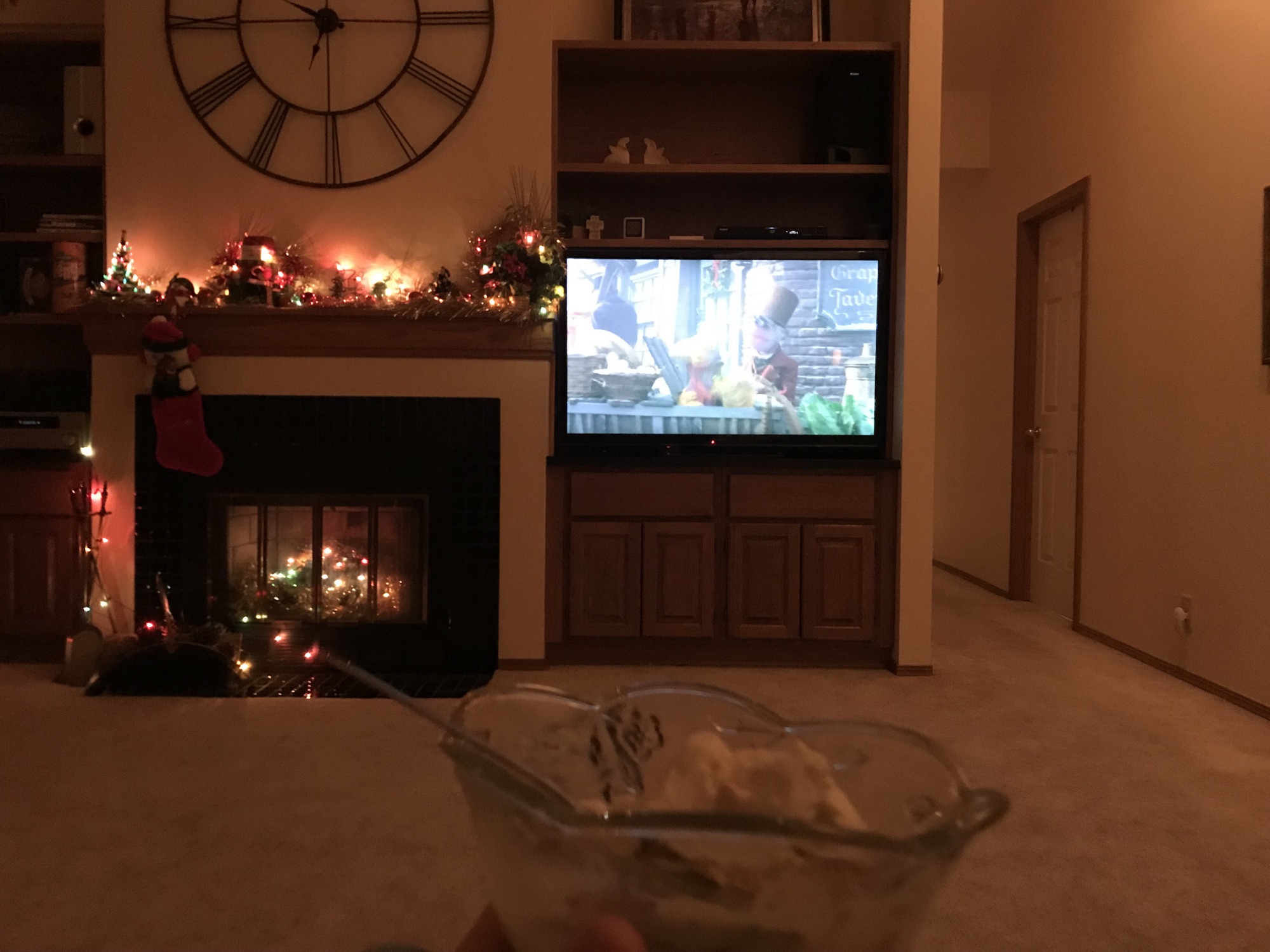 Watching a Christmas movie with ice cream